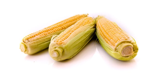 Three corns isolated on white