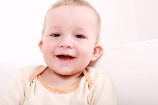 Portrait of cute newborn laughing