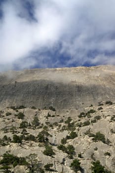 Crimean rocks in clouds. Sokol. Novyi Svet.