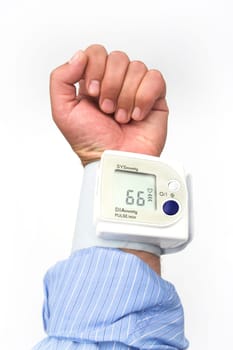 sphygmomanometer on the man's hand