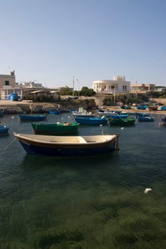photo of a little boat in the sea for fishing