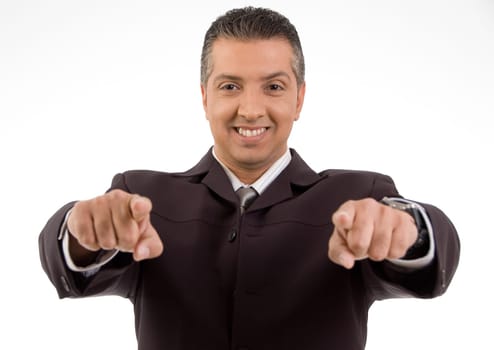 Senior man pointing at you isolated on white background