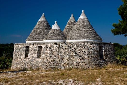 Photo of a typical historic stone building from the south of italy