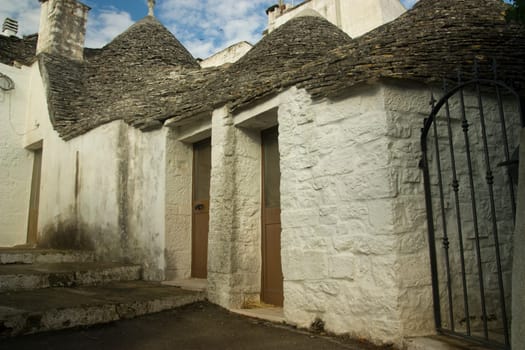 Photo of a typical historic stone building from the south of italy