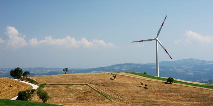Rural landscape in Molise (center Italy) with solitary wind turbine