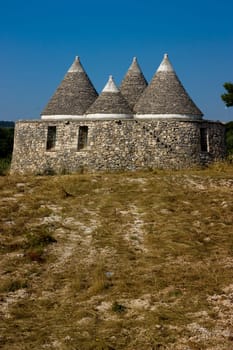 Photo of a typical historic stone building from the south of italy
