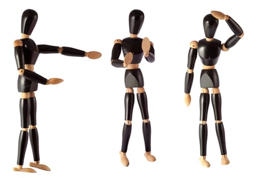 wooden dummy painted black on a white background