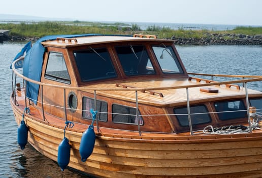 Wooden Fishing boat docked at a fishing town in Sweden