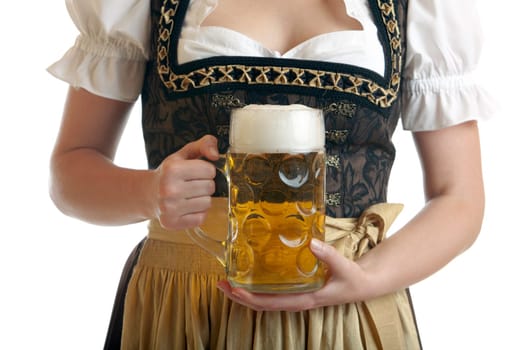 Bavarian Woman in Dirndl holds Beer stein in front of breast at Oktoberfest