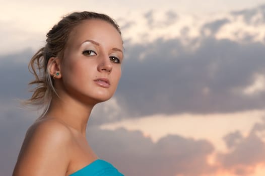 beautiful blond girl outdoor portrait at sunset