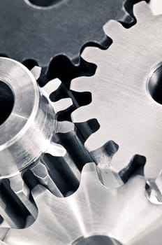 Industrial metal gears and machine parts connected