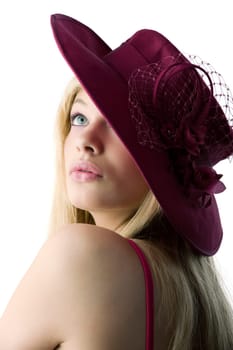 beautiful blond woman with a red hat and a red top making face and smiling