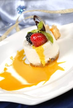 dessert ice cream with berries on the white dish