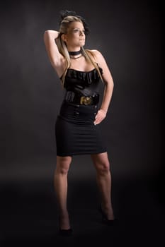 Attractive young woman isolated on black background