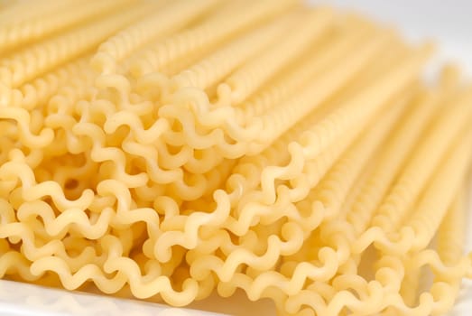 raw pasta on the white table