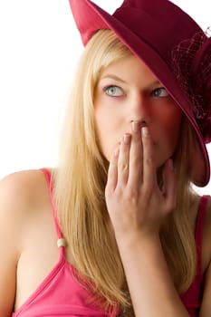 cute blond woman with a red hat covering with hand the lips and looking surprised