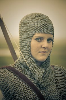 bows woman / medieval armor / historical story  / retro split toned