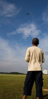 A man flying a kite.
