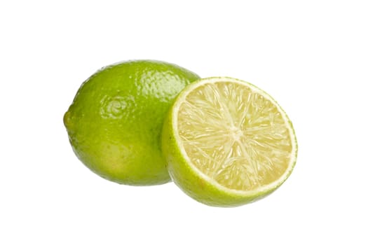 A fresh lime isolated on white background. Shallow depth of field
