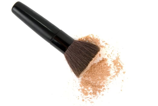 Cosmetic powder and black brush isolated