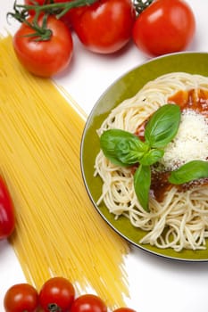 Pasta with tomato sauce basil and grated parmesan