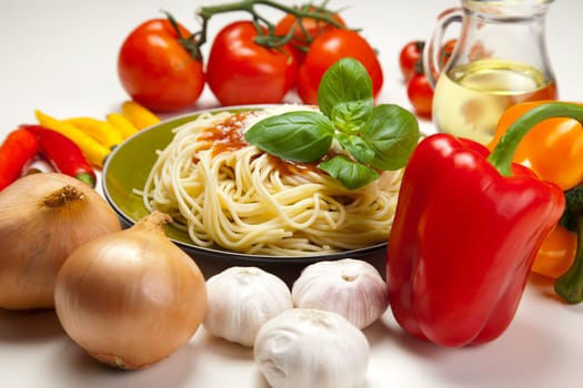 Pasta with tomato sauce basil and grated parmesan
