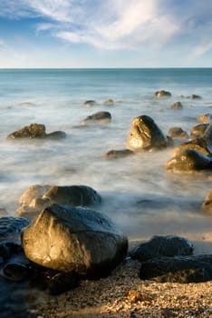 It is sunset of beautiful coral reef coastline.