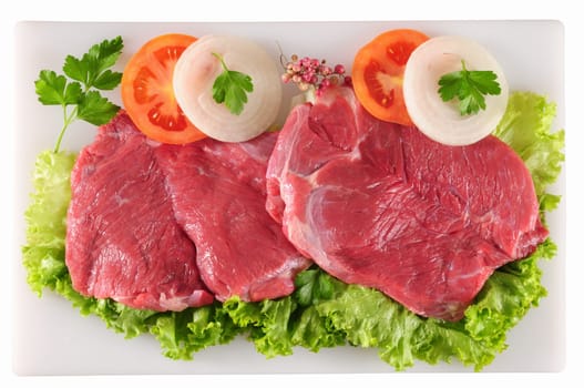 Fresh raw meat with vegetables