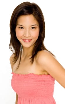 A pretty young asian woman in pink on white background