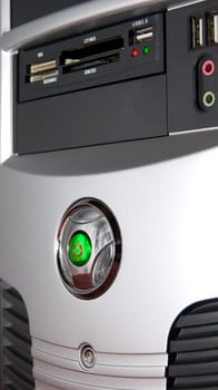 Close up of computer system box. Power and Reset button.