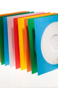 Multiple disc sleeves, standing on a clean background with a disc showing in the first window.