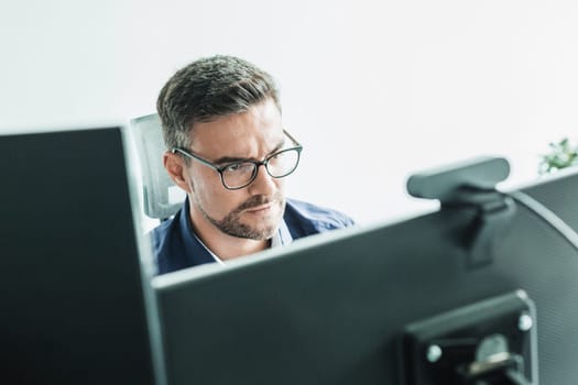 Remote work and modrn conectivity. Virtual meeting with many participents online. Webinar. Businessman talking online with employees via video connection