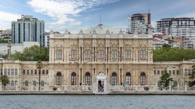 Istanbul, Turkey - May 10, 2023: View from Bosporus strait of Dolmabahce Palace, or Dolmabahce Sarayi, located in Besiktas district on the European coast