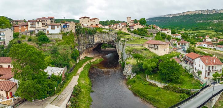 Beautiful view of Puentedey, a picturesque village with a natural bridge over the river. Merindades, Burgos, Spain, One of the Beautiful Towns