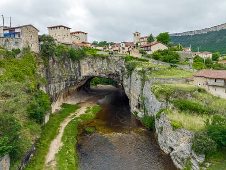Beautiful view of Puentedey, a picturesque village with a natural bridge over the river. Merindades, Burgos, Spain, One of the Beautiful Towns