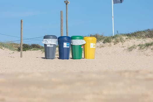 14 march 2023 Peniche, Portugal: Sort Garbage Bins On the Beach. Mid shot