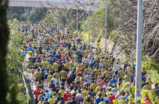 March 12, 2023 Lisbon, Portugal: people run a marathon. Mid shot