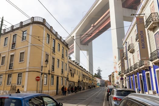March 12, 2023 Lisbon, Portugal: Houses in the residential streets in Portugal by the 25th of April Bridge. Mid shot