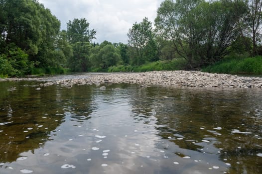 The Eder - A river in Germany in a green landscape