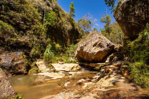 Isalo National Park in Ihorombe Region. Wilderness landscape with water erosion into rocky outcrops, plateaus, extensive plains and deep canyons. Beautiful Madagascar landscape.