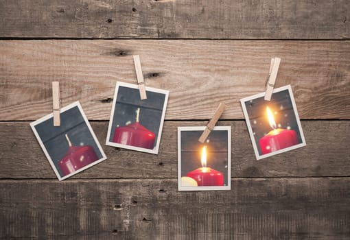 Second Advent, Four old photo frames with Advent candles on a rustic wooden wall