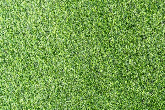 Artificial grass is used to decorate the garden for beauty.