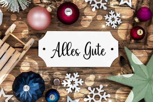 Colorful Christmas Decor With Bokeh, Christmas Balls And Snowflakes, With Sign With German Text Alles Gute, Which Means Best Wishes In English