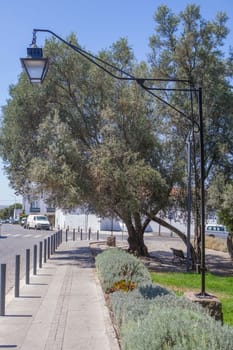Public street lamp with lowering mechanism, Beja dowtown, Portugal
