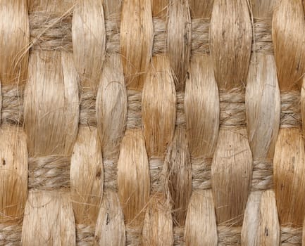 The texture of a jute brown fabric with a large interlacing of fibers, macro