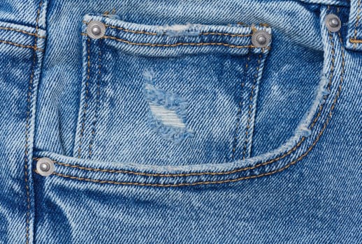 Blue jeans front pocket with buttons