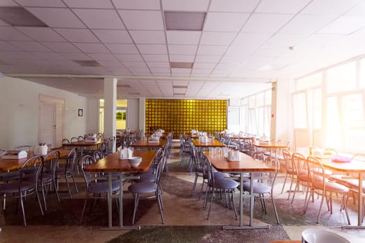 Chairs and tables. The dining hall is quarantined.