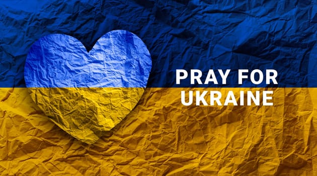 Flag of Ukraine in paper heart shape. Ukrainian national symbol.