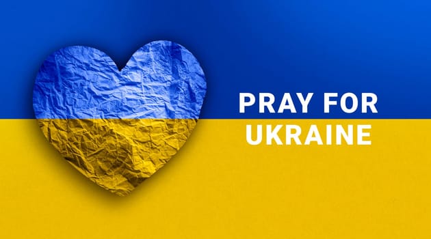 Flag of Ukraine in paper heart shape. Ukrainian national symbol.