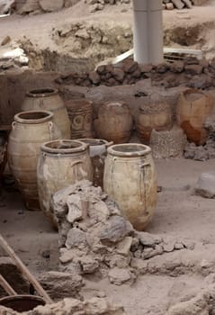 Santorini, Greece - July 01, 2021: Recovered ancient pottery in prehistoric town of Akrotiri, excavation site of a Minoan Bronze Age settlement on the Greek island of Santorini